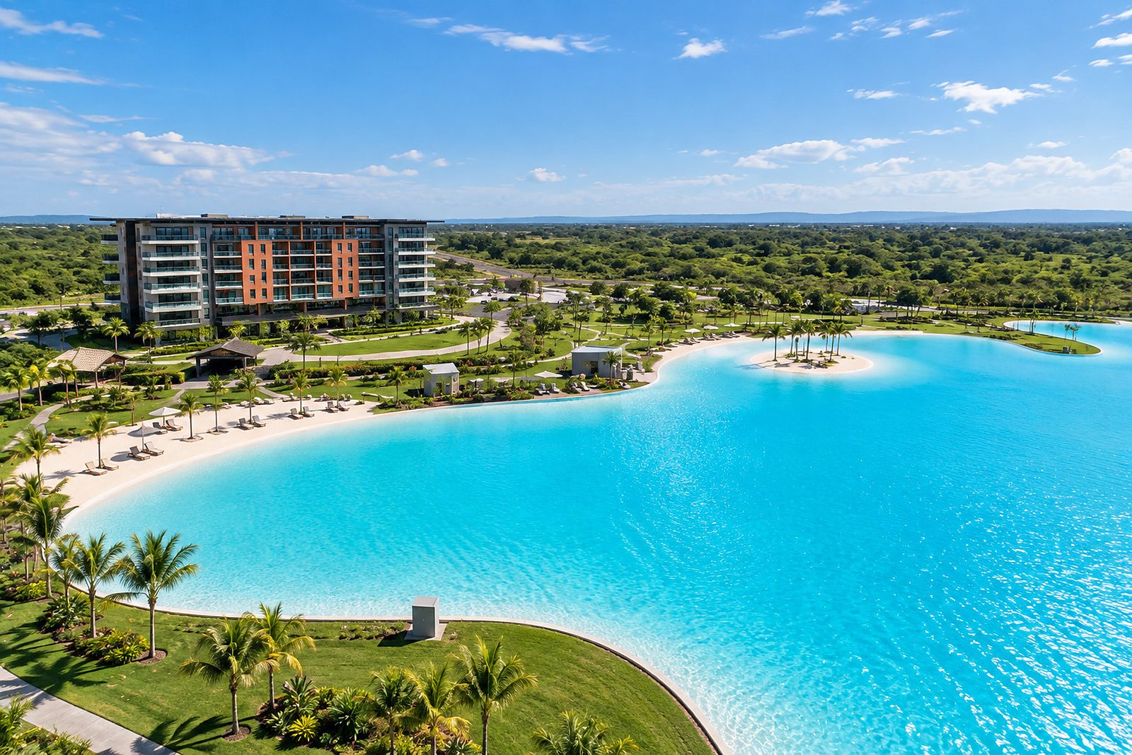 Torre Miravalles above the Crystal Lagoons lagoon at Ciudad Nya