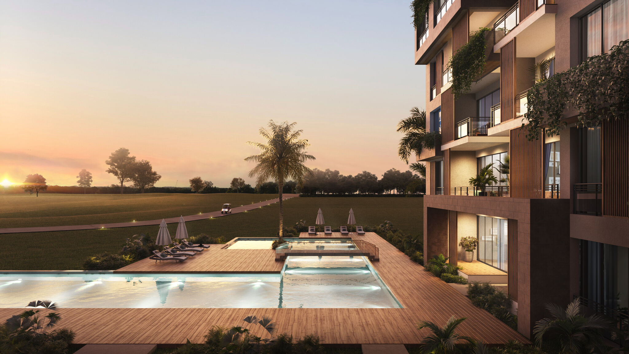 Riviera Bay pool deck at dusk on the Cana Bay golf corridor